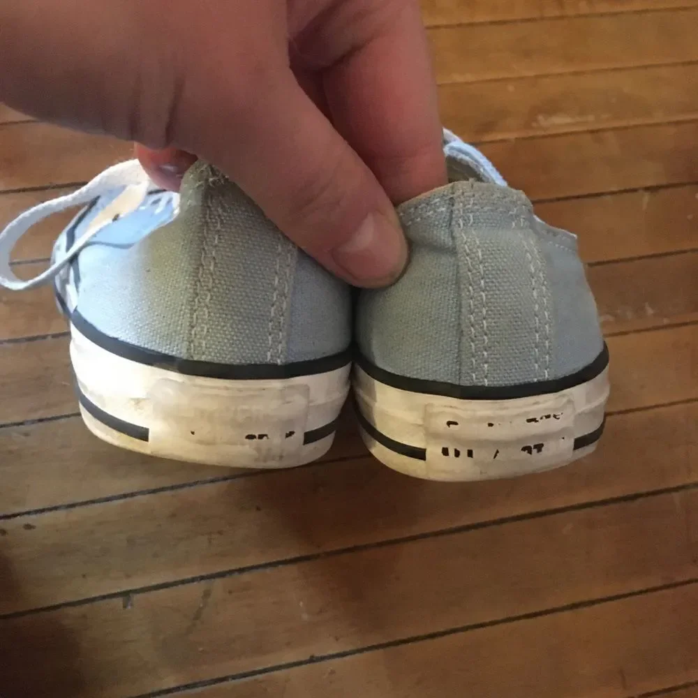 Baby blue Converse low top boat shoes